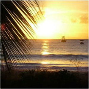 Sunset at Carlisle Bay in front of the beach cottage rental Barbados